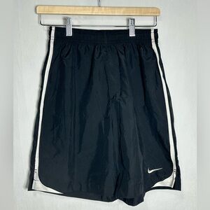 Nike Men’s black soccer shorts with white stripe -‎ small